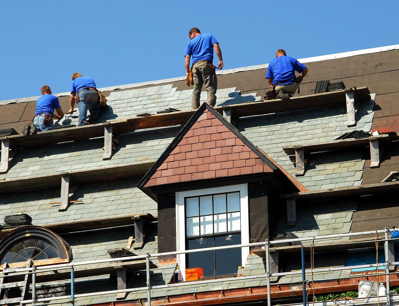 Workers Fixing Roof